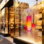 Clear polymeric overlaminate protecting an outdoor window graphic
