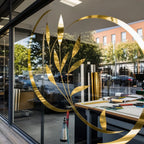 Gold chrome printable vinyl used for a retail window graphic